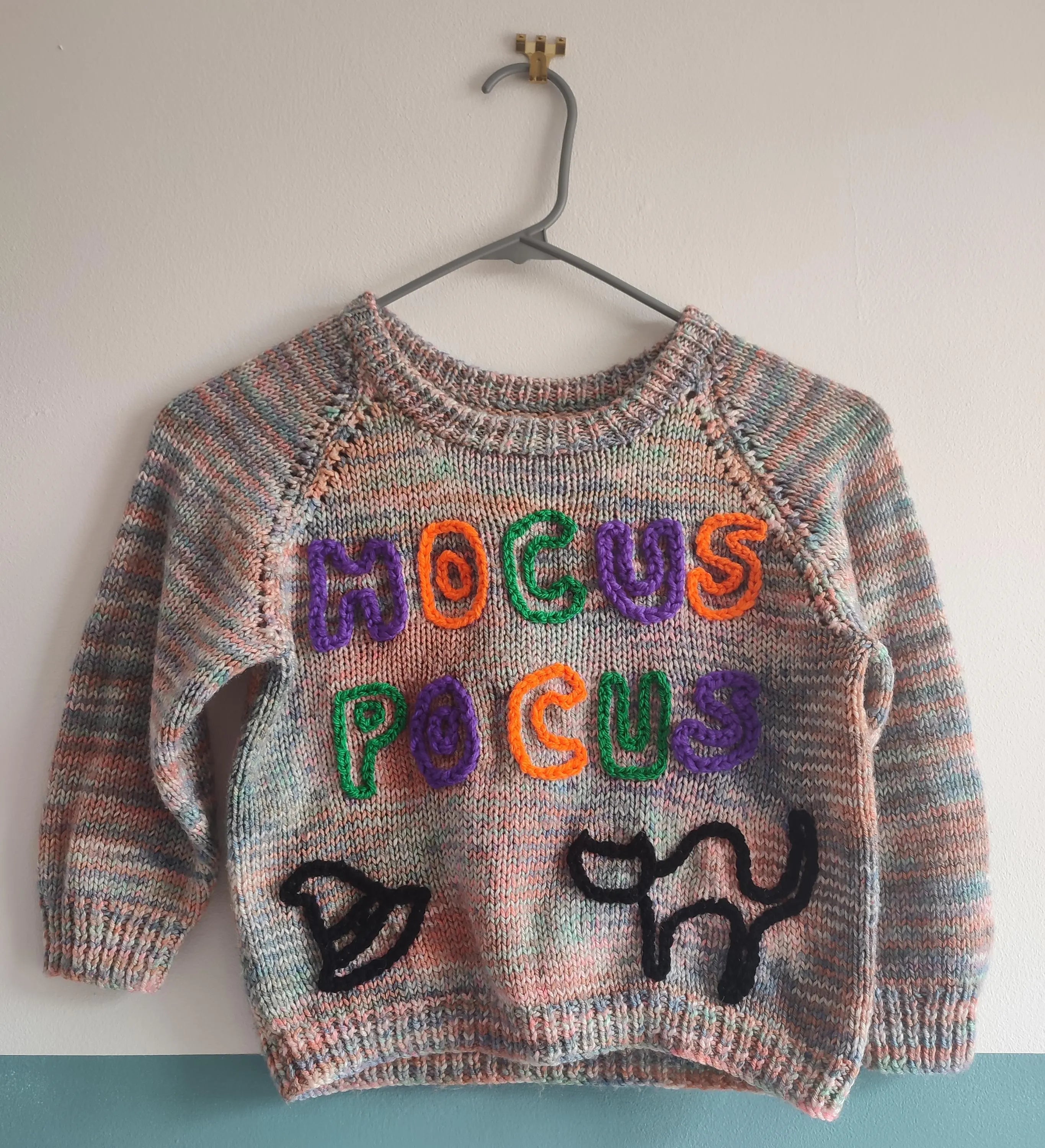 Hand embroidered hocus pocus Halloween jumper. Handmade knit with rainbow wool. Size 3-4 years