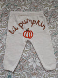 Hand embroidered cream neutral lil pumpkin knitted trousers. Halloween, autumn knit. Size 9-12 months