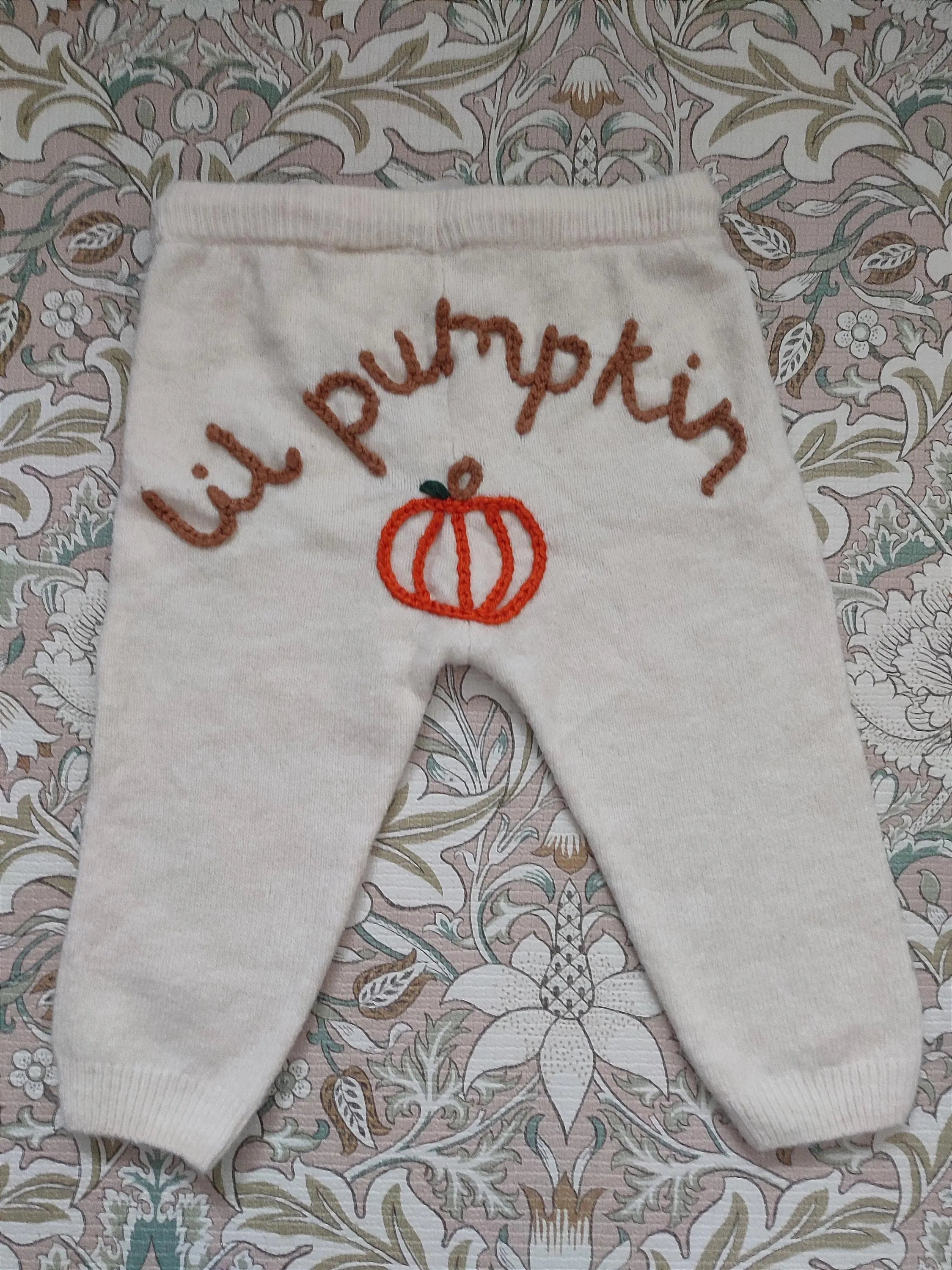 Hand embroidered cream neutral lil pumpkin knitted trousers. Halloween, autumn knit. Size 9-12 months