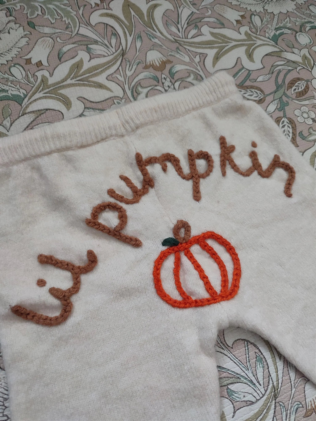 Hand embroidered cream neutral lil pumpkin knitted trousers. Halloween, autumn knit. Size 9-12 months