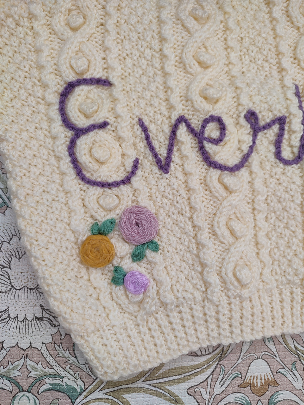 Mystery knit- name + small design