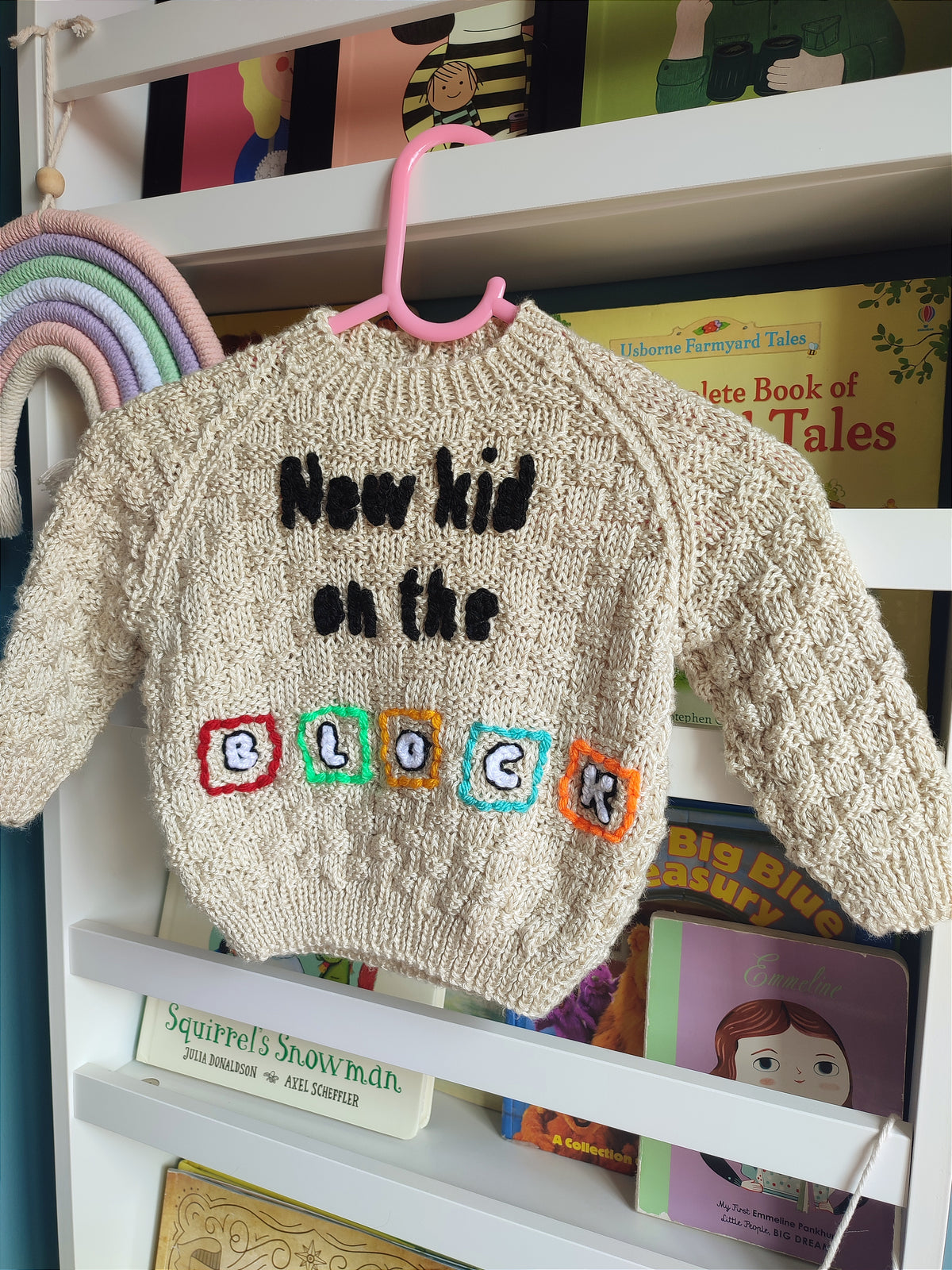 Hand embroidered New Kids on the Block design. Beige hand knitted jumper 6-12 months