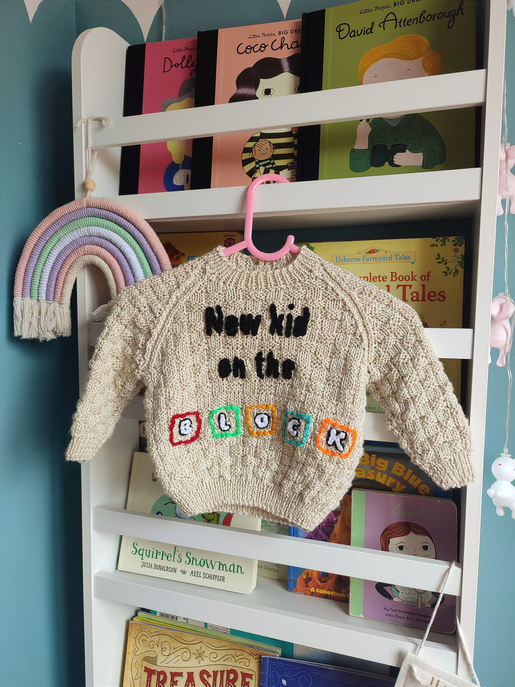 Hand embroidered New Kids on the Block design. Beige hand knitted jumper 6-12 months