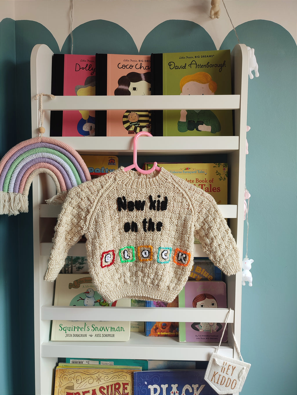 Hand embroidered New Kids on the Block design. Beige hand knitted jumper 6-12 months